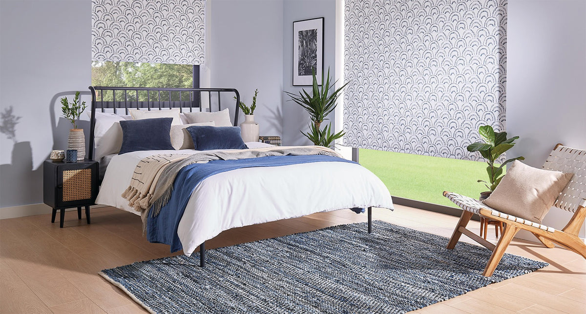 Patterned roller blind in a bedroom