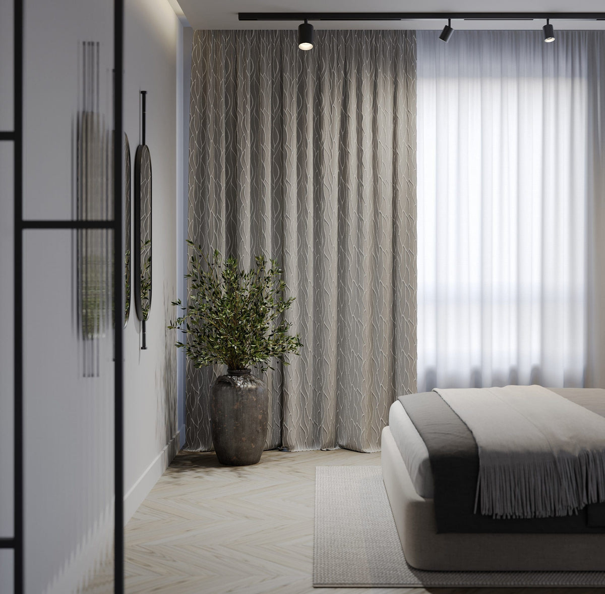 Silver curtains and a voile layer on a ceiling track
