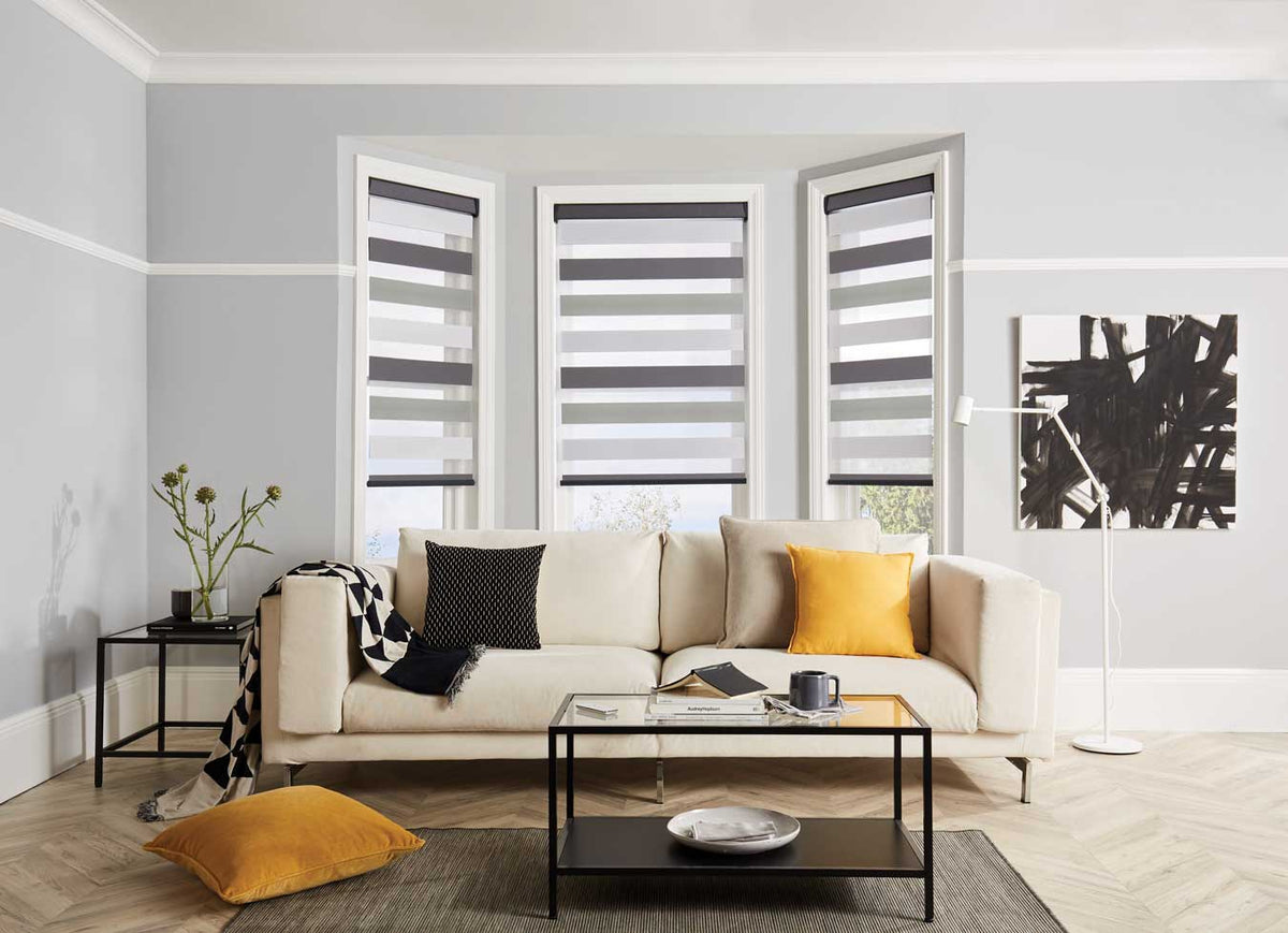 Day & Night blinds across a bay window