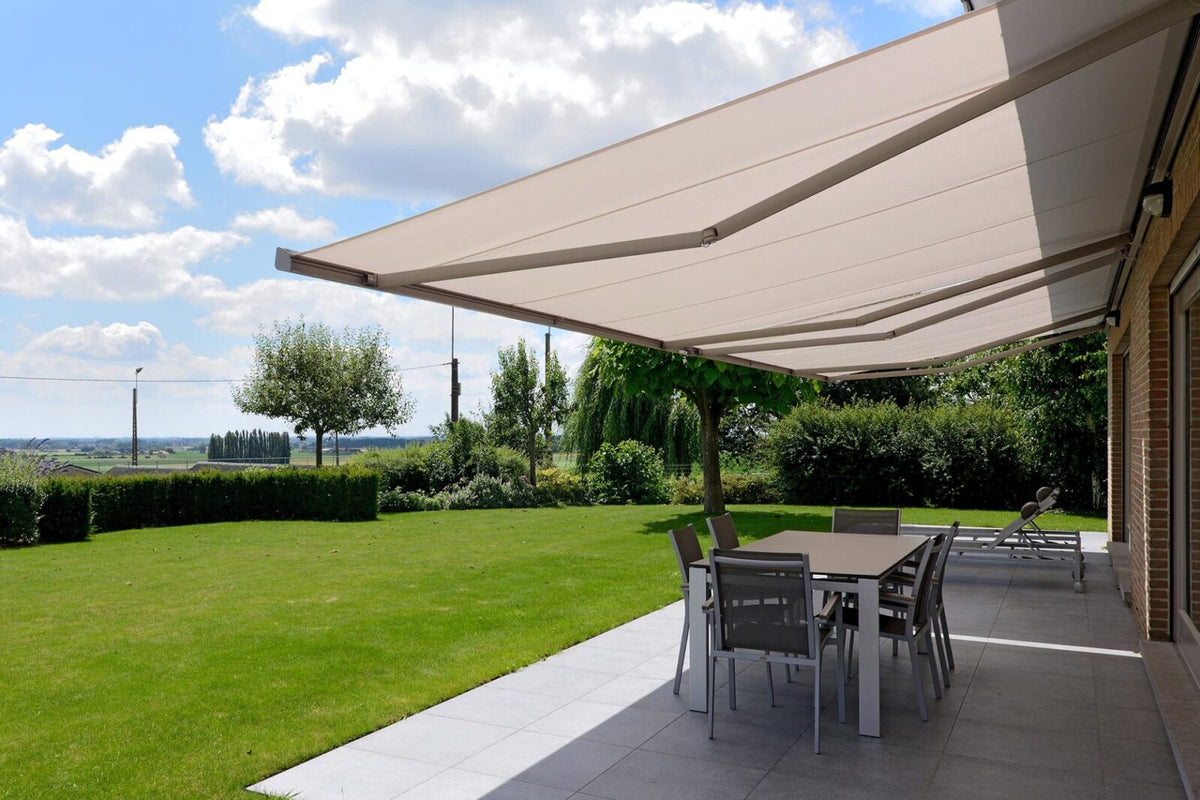 Retractable awning extended over a patio dining area