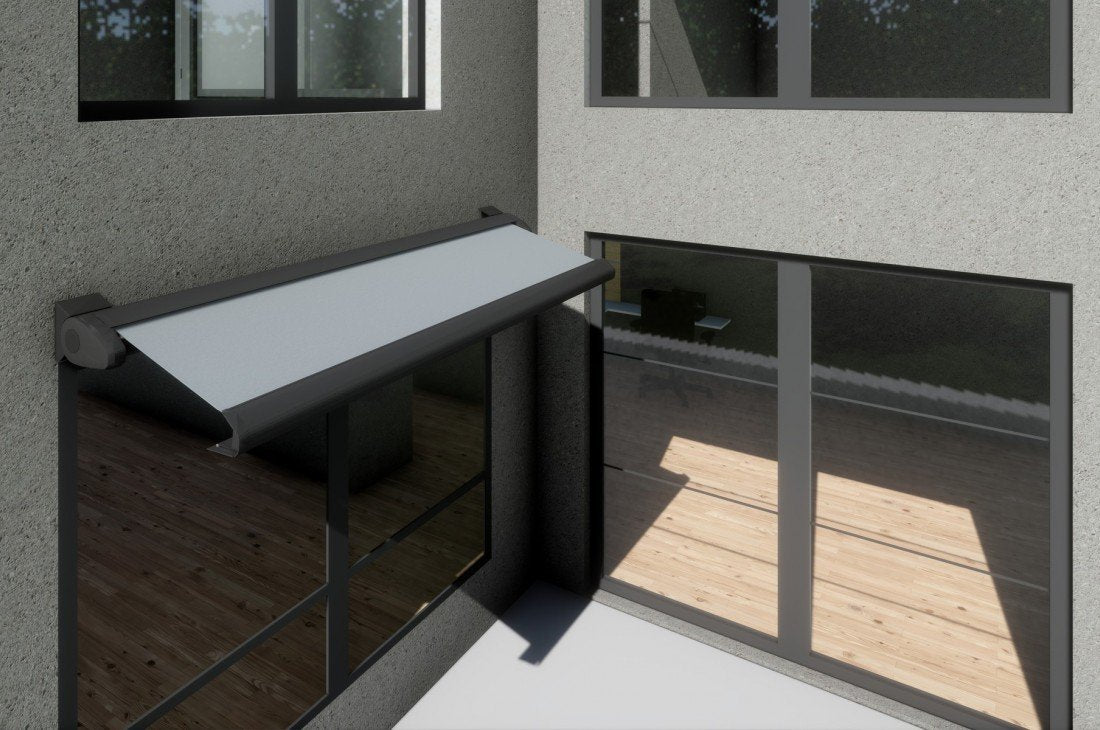 Cassette awning above a ground-floor window