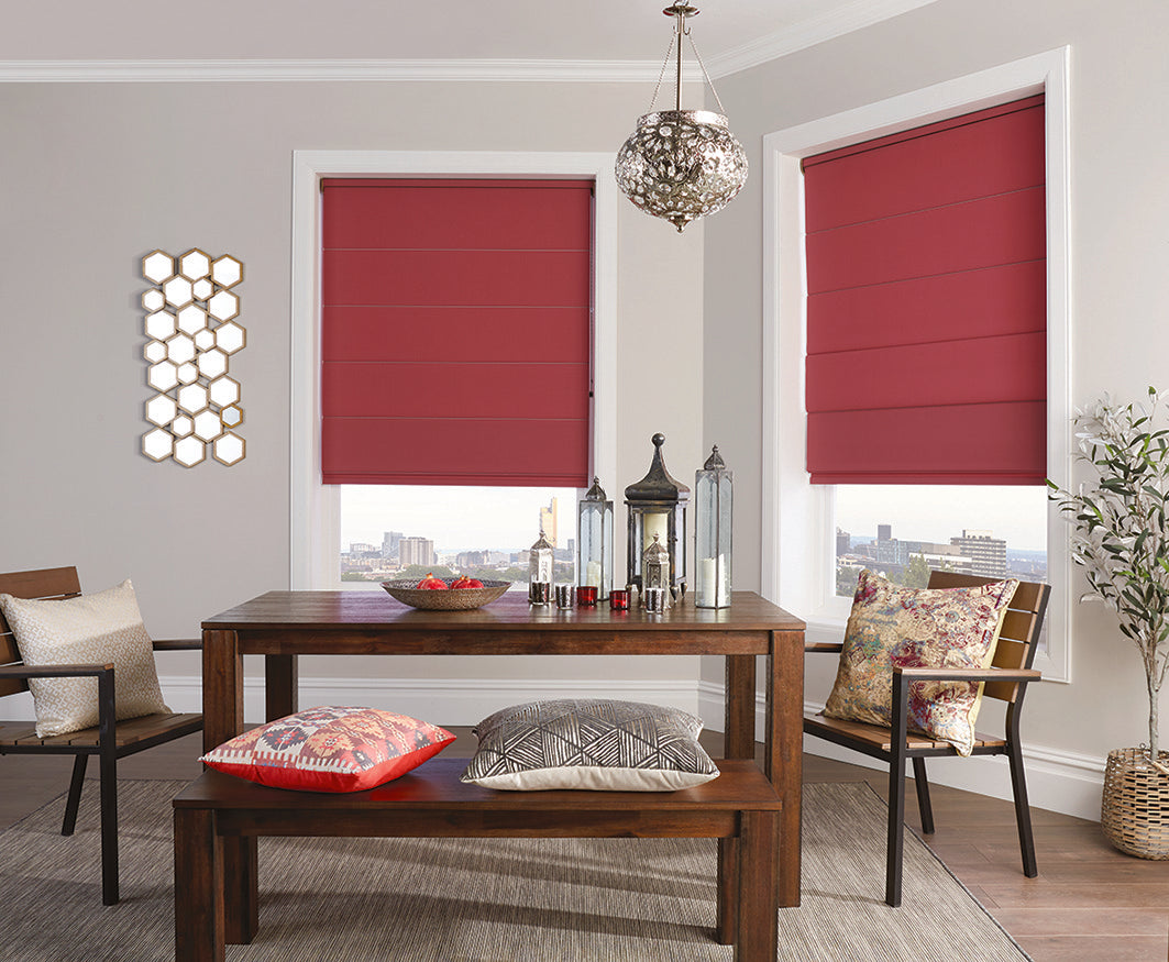 Pomegranate Roman blind in a dining room