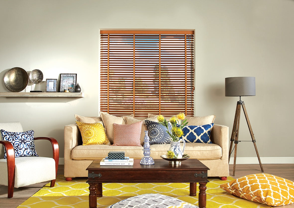 Cherry-finish wooden blinds in a living room